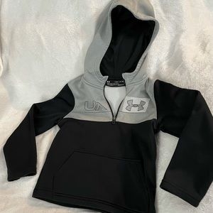 Kids Under Armour pullover hoodie with top front zipper.